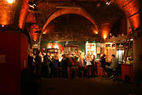 A bar in one of many cavernous rooms.